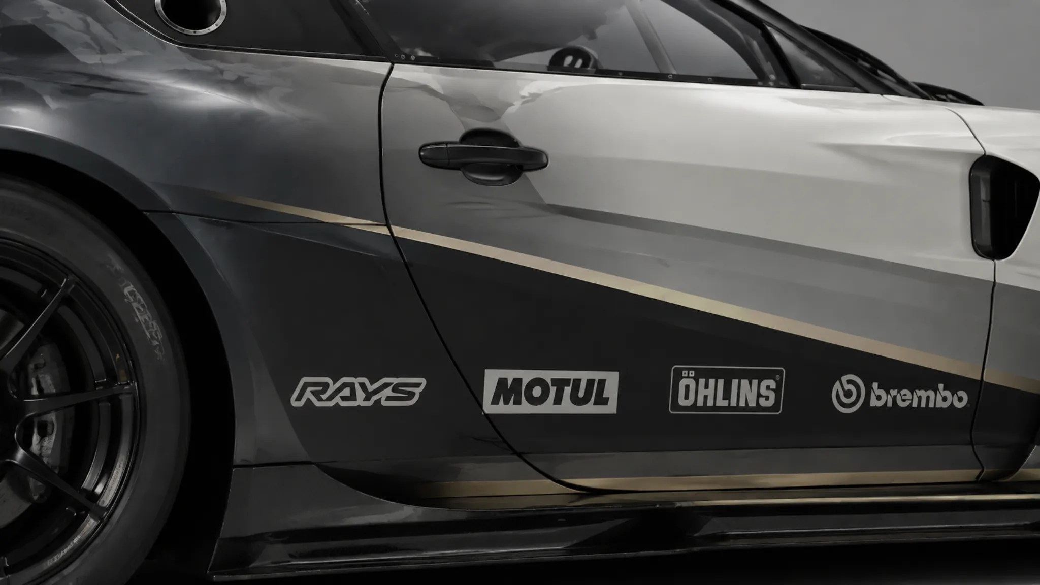 Racing livery side panel showing sponsor placement and wheel-arch interference
