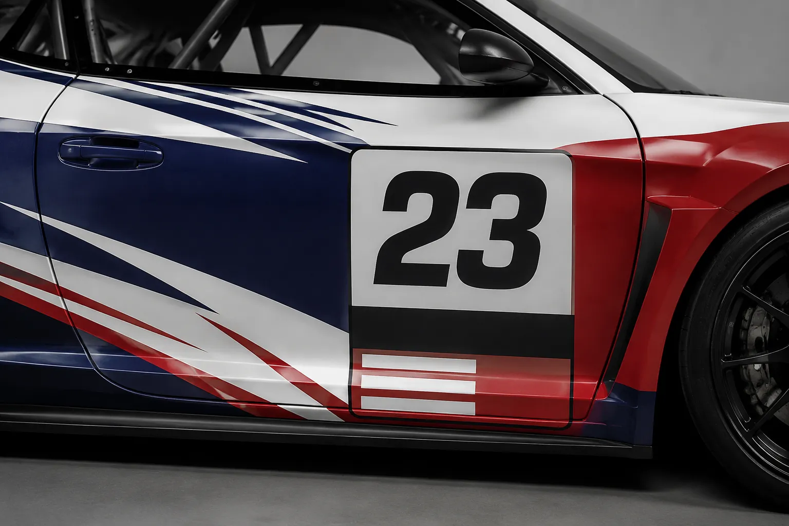 Close vehicle-side concept view showing competition number, sponsor block, seam, and wheel arch relationships